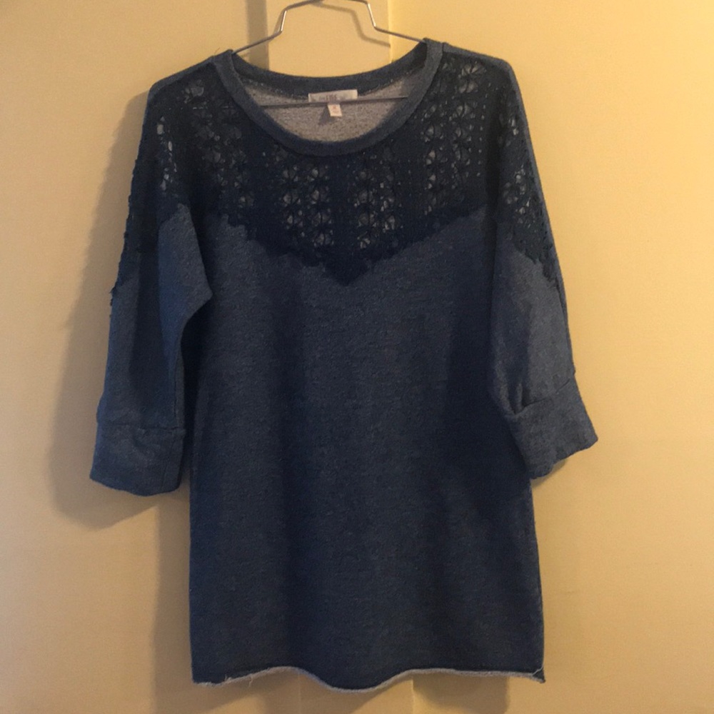 Navy blue sweater.